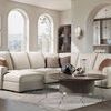 Modern Mood round cocktail table styled in a living room with cream sectional sofa and light walls