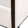 Upholstered side corner and low footboard with visible textured white fabric and brown oak frame