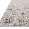 Low-angle view emphasizing the rug's thin profile and detailed transitional pattern.