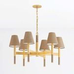 Side angle view highlighting brass chain and frame connecting six grasscloth lampshades