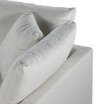 Close-up of cushion corner emphasizing feather-blend fill and fabric detail