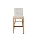 Front view of Gaston Stool highlighting cushioned seat and slender legs with footrest
