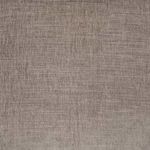 Close-up of smooth neutral beige upholstery fabric with subtle woven texture