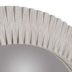 Close-up of the whitewashed geometric wood texture on the mirror’s rim