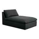 Side angled view showing chaise’s thick cushioning and raised backrest support