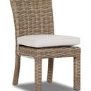 Armless outdoor dining chair with aged tobacco all-weather wicker and off-white cushioned seat