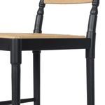 Close-up showing black ash wood joint between seat frame and backrest posts