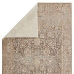 Folded edge close-up with visible light cream backing fabric and detailed taupe border