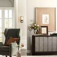 Harper Console in upscale room setting with wingback chair, framed art, flowers, and decorative objects