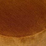 Top close-up view focusing on the smooth, rounded top surface covered in plush rust fabric