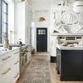 Runner size Margot rug laid between kitchen cabinets and island with marble countertop