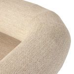 Detail showing teak frame legs and underside of the cushioned seat