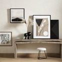 Repeated bar cart lifestyle scene with painting centered on light textured wall