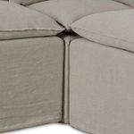 Joint detail between modular sections highlighting slipcover seams and connection points