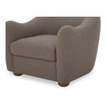 Bria Accent Chair from opposite angled view emphasizing plush seat cushion and arm shape in bedroom setting