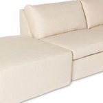 Close-up showing pillow back cushions attached to flared rolled arm