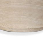 Close-up focusing on base of table with visible plinth and fine surface texture