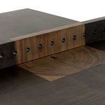 Edge of ping pong table showing metal finish and sharp corner detail