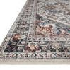 Close-up low angle of Samra Ivory / Denim Rug showing texture and vibrant pattern details with fringed edge