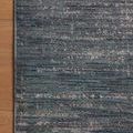 Close-up corner of Arden rug on wood floor highlighting color variation and fine ribbing detail