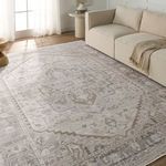 Rectangular rug styled in living room setting with beige sofa and natural light from window