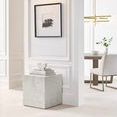 18 inch solid brass picture light mounted above framed artwork in a bright white room with paneled walls