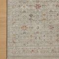 Close-up of Ida Spa Multi Rug corner on light wood floor highlighting detailed pattern and edge finish