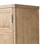 Close-up corner view showing detailed wood grain and paneled door edges.