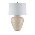Mimi Ivory Table Lamp lit softly with warm glow from drum shade and ceramic base