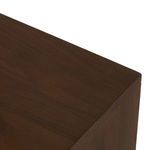 Top corner close-up with visible wood grain highlighting dark walnut and mahogany patterns