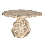 Close-up angled side view highlighting the rough surface texture of marble base and edges of the top