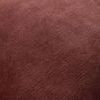 Close-up of soft plush wine velvet fabric texture on throw pillow