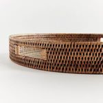Close-up side view highlighting open handle cutout and textured rattan weave on tray edge