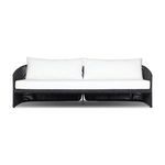 97-inch outdoor sofa with black linear rope frame and thick white cushions, angular cutout back detail