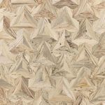 Close-up overhead view of intricately pieced whitewashed spalted wood tabletop parquet pattern