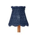 Annabelle Indigo Tapered Chandelier Shade with visible light shining through woven pattern from front