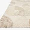 Milo Pebble Multi Rug side angle showing low profile and textured wool pile details.