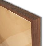 Close-up of walnut frame corner with visible wood grain and painting edge.