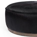 Another side detail showing consistent hide texture and wooden base