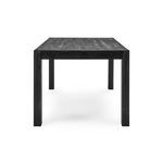 End view showing the table’s surface texture and thickness with visible wood grain