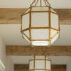 Side view of Morris Small Lantern pendant highlighting geometric metal frame and frosted glass