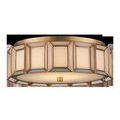 Round flush mount ceiling light with white milk glass panels framed in antique brass metal ribs
