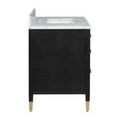 Side view of black linen vanity with all drawers closed and gold-capped tapered legs