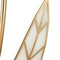 Close-up of the white textured leaf section with gold outlining in geometric pattern