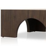 Detailed view of one arch and adjacent side showing smooth curves and wood texture