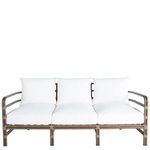 Rear angled perspective of the sofa's open oak frame with seat support straps