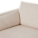 Close-up of loose arm cushion resting against back cushion on Toland sectional