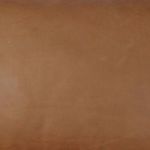 Macro shot showing fine natural grain and smooth finish of the leather upholstery