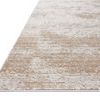 Angled close-up of Townes Sand rug edges highlighting thin profile and smooth binding