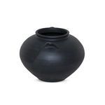 Side view of vase showcasing one handle protruding on bulbous black terracotta body